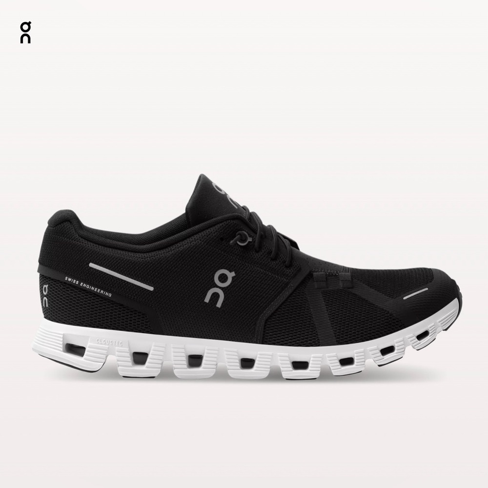 On Running Black Athletic Shoes with White Accents